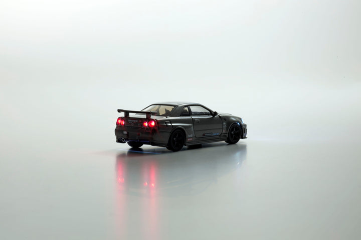 Kyosho 1:64 NISSAN SKYLINE GT-R with LED (NISMO BNR34 CRS Version) 07130LGR