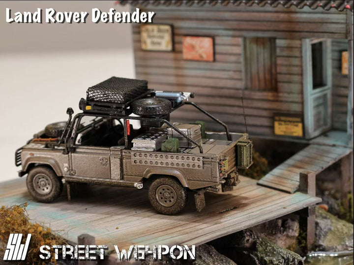 [Preorder] Street Weapon 1:64 Land Rover Defender Tomb Raider Muddy Livery