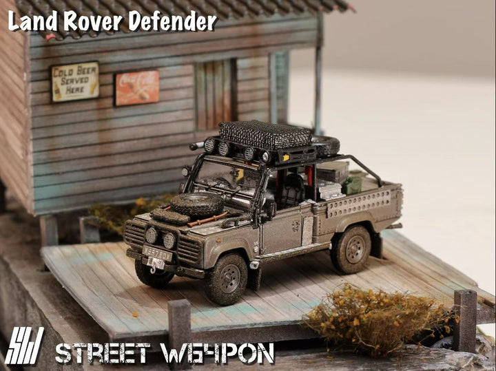 [Preorder] Street Weapon 1:64 Land Rover Defender Tomb Raider Muddy Livery