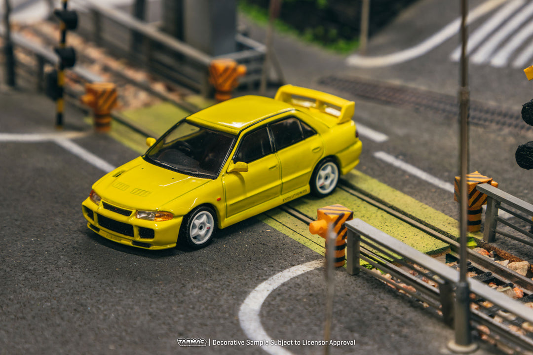 [Preorder] Tarmac Works 1:64 Mitsubishi Lancer GSR Evolution III - Yellow