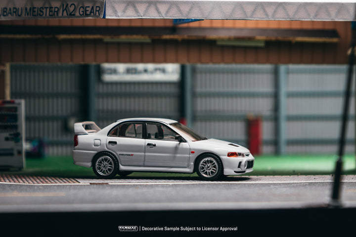 [Preorder] Tarmac Works 1:64 Mitsubishi Lancer RS Evolution IV White Global 64 T64G-076-WH-B