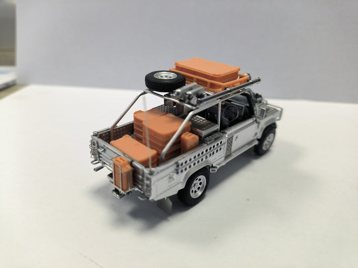 [Preorder] DCM 1:64 Land Rover Defender Tomb Raider Livery