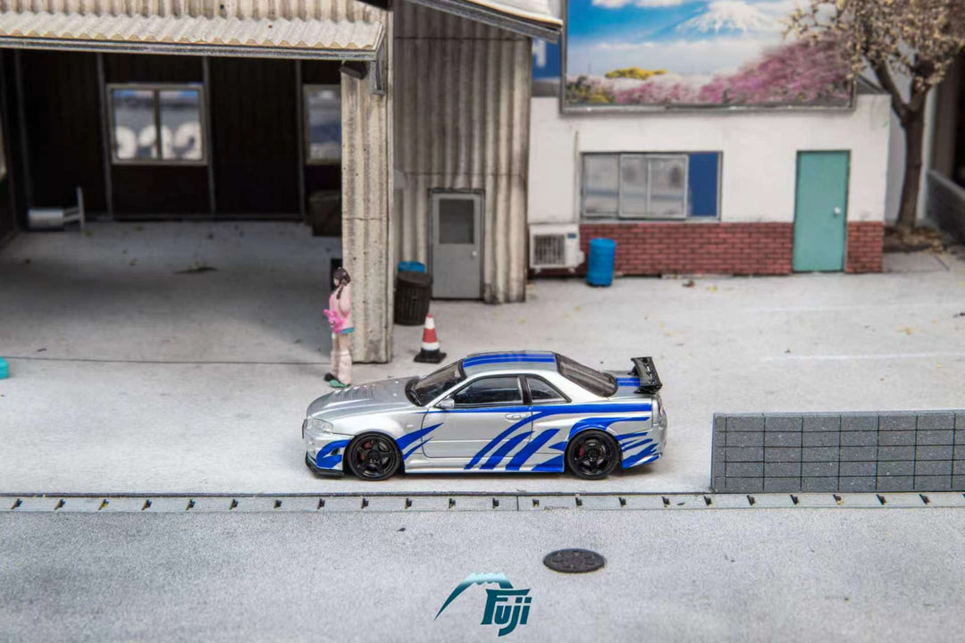 [Preorder] Fuji 1:64 Nissan Skyline GT-R R34 Nismo Z-Tune Silver Blue Livery (3 Variants)