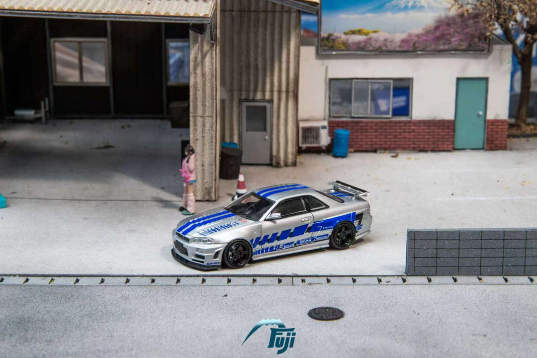 [Preorder] Fuji 1:64 Nissan Skyline GT-R R34 Nismo Z-Tune Silver Blue Livery (3 Variants)