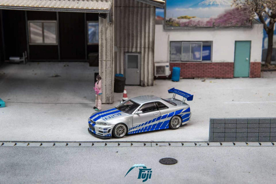 [Preorder] Fuji 1:64 Nissan Skyline GT-R R34 Nismo Z-Tune Silver Blue Livery (3 Variants)