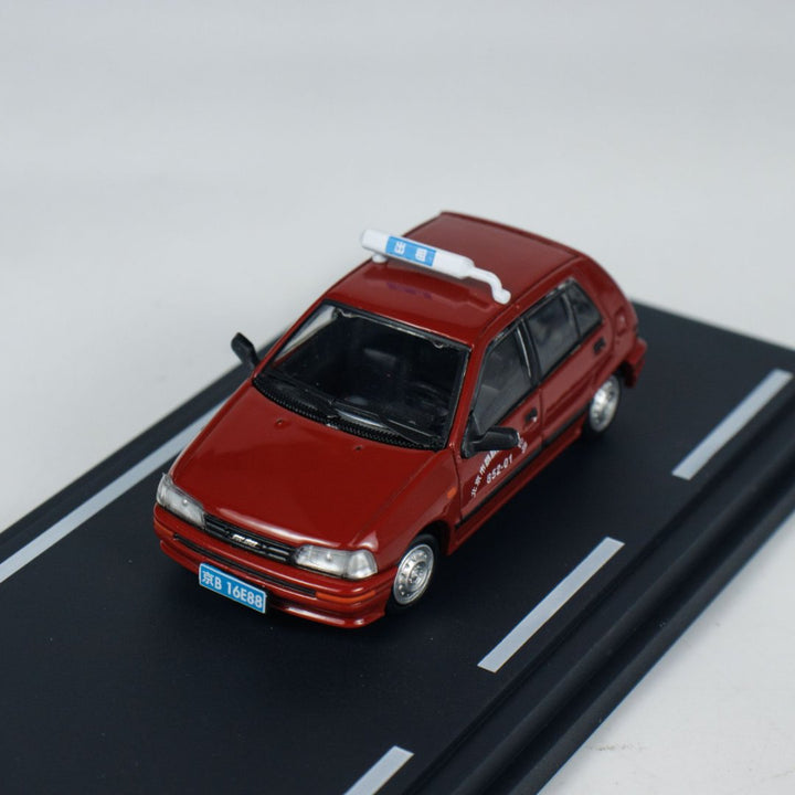 [Preorder] BM Creations 1:64 Daihasui Charade Beijing Taxi HEC 64B0445