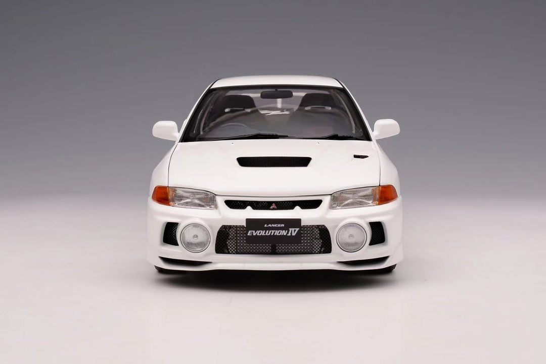 [Preorder] MOTORHELIX 1:18 Mitsubishi Lancer Evolution IV (3 Colours)