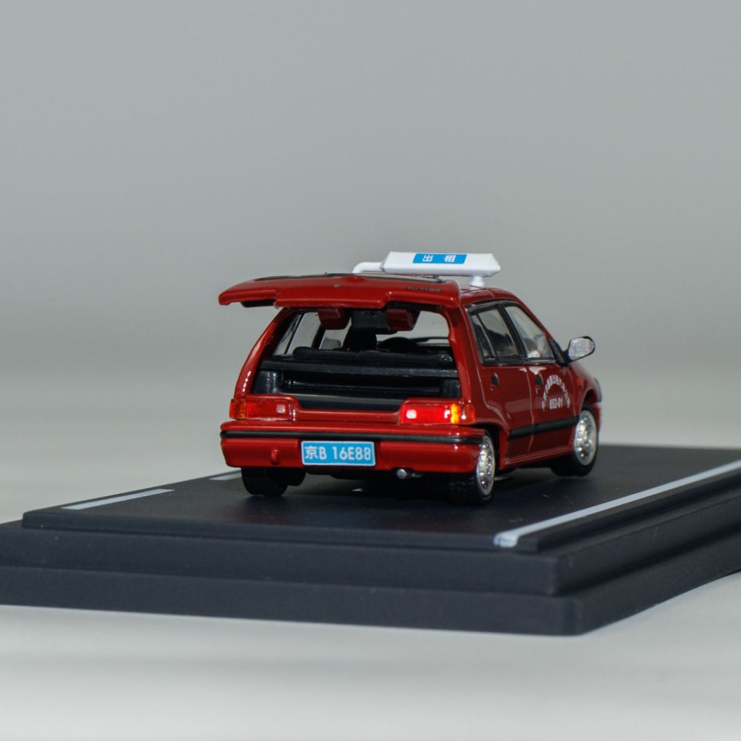 [Preorder] BM Creations 1:64 Daihasui Charade Beijing Taxi HEC 64B0445