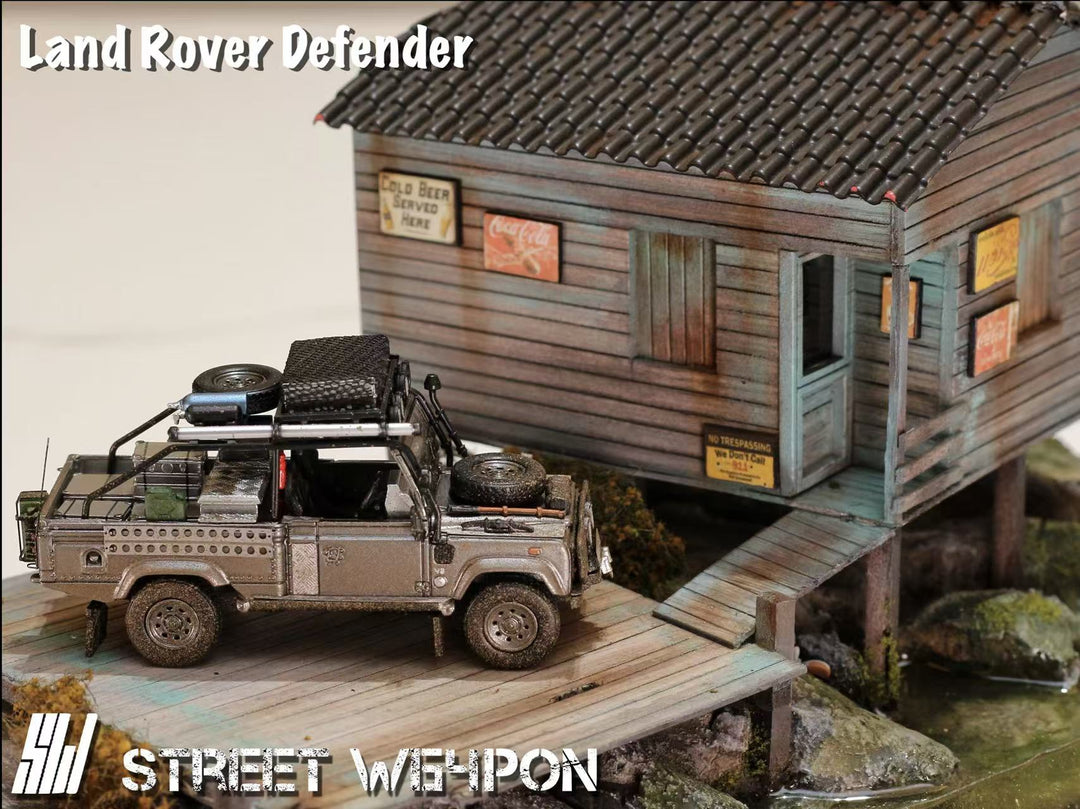 [Preorder] Street Weapon 1:64 Land Rover Defender Tomb Raider Muddy Livery