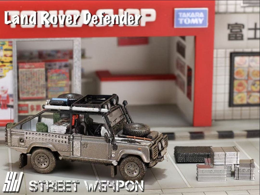 [Preorder] Street Weapon 1:64 Land Rover Defender Tomb Raider Muddy Livery