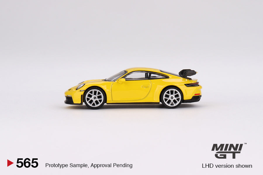 Mini GT 1:64 Porsche 911 (992) GT3 Racing Yellow MGT00565 Side