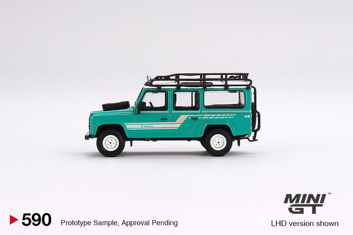 Mini GT 1:64 Land Rover Defender 110 1985 County Station Wagon Trident Green MGT00590 Side