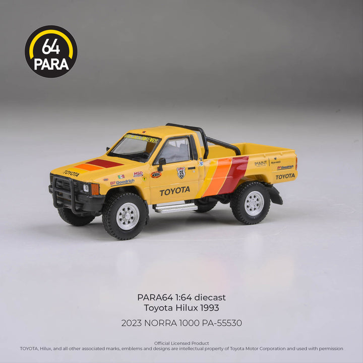 [Preorder] PARA64 1:64 2023 Toyota Hilus NORRA 1000 Yellow RHD PA-55530