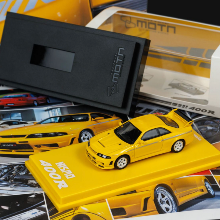 [Preorder] Kyosho 1:64 Mini Car & Book Nissan Nismo 400R Yellow