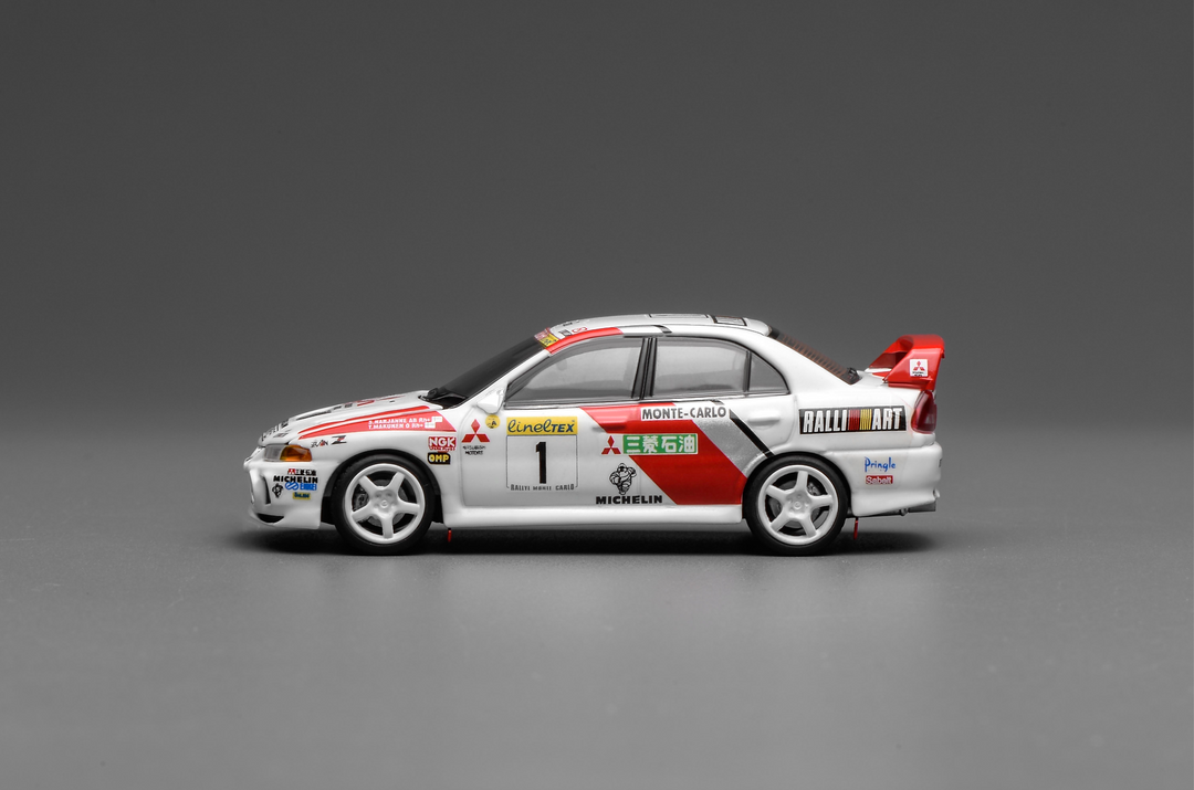 [Preorder] MOTORHELIX 1:64 MITSUBISHI LANCER EVOLUTION IV GSR MONTE CARLO LIVERY M64010