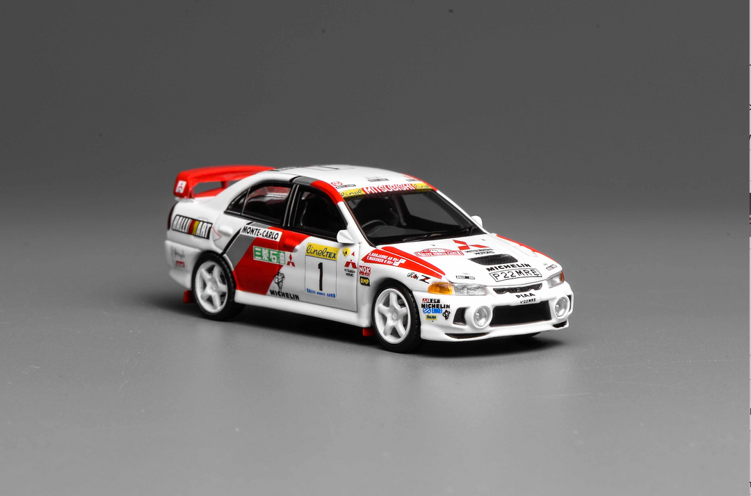 [Preorder] MOTORHELIX 1:64 MITSUBISHI LANCER EVOLUTION IV GSR MONTE CARLO LIVERY M64010