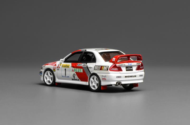 [Preorder] MOTORHELIX 1:64 MITSUBISHI LANCER EVOLUTION IV GSR MONTE CARLO LIVERY M64010