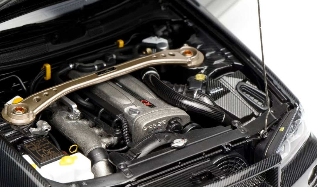 [Preorder] MOTORHELIX 1:18 Nissan Skyline GT-R(R34) CUSTOMIZED VERSION Carbon Fiber M83413