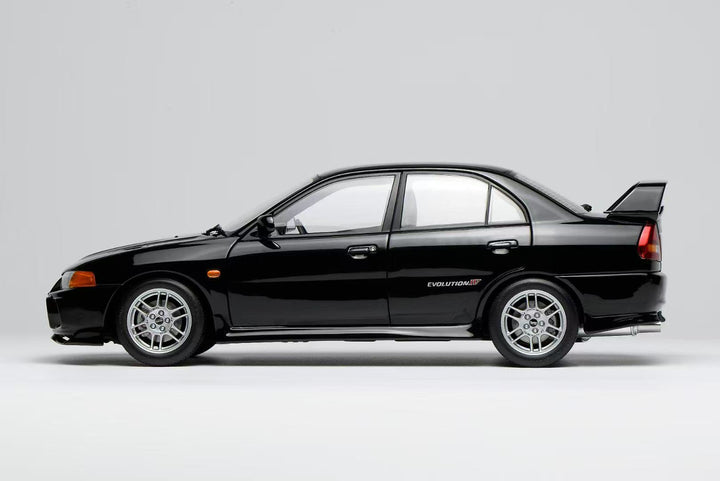 [Preorder] MOTORHELIX 1:18 Mitsubishi Lancer Evolution IV - Pirens Pearl Black