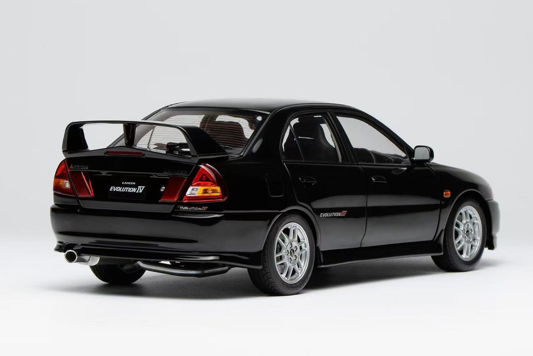[Preorder] MOTORHELIX 1:18 Mitsubishi Lancer Evolution IV - Pirens Pearl Black