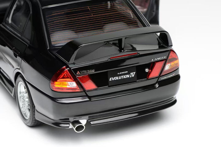 [Preorder] MOTORHELIX 1:18 Mitsubishi Lancer Evolution IV - Pirens Pearl Black