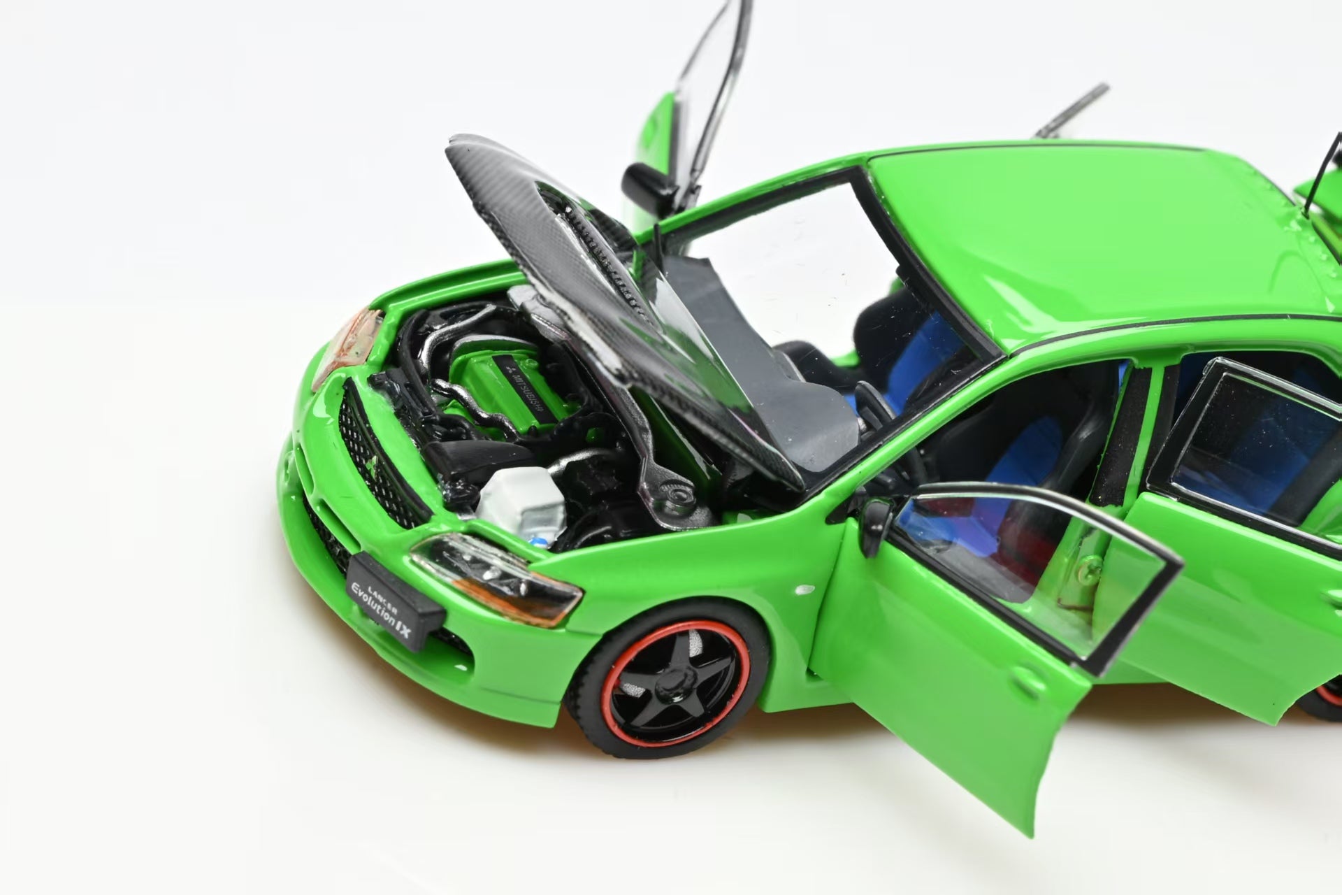 IHCM 1:64 MITSUBISHI LANCER EVIUTION IX GSR Red/ Green (2 Colours