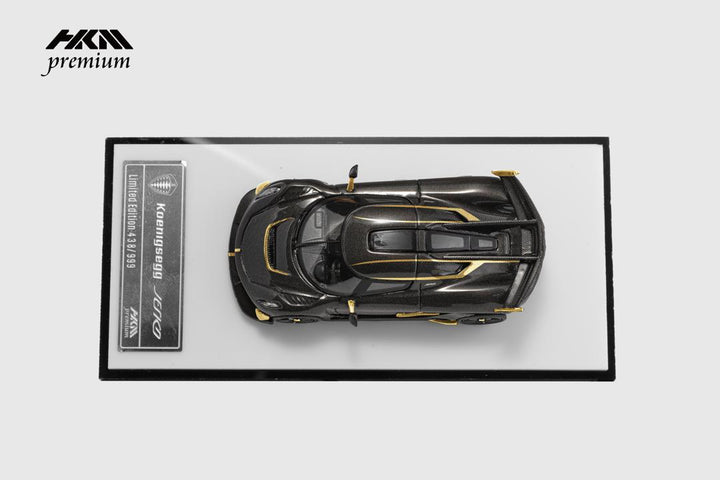[Preorder] HKM Premium 1:64 Koenigsegg Jesko Attack - Carbon black gold