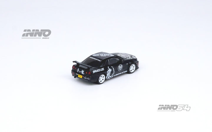 Inno64 1:64 Nissan Skyline GT-R (R34) "BRUCE LEE” Black IN64-R34-BRUCELEE Rear