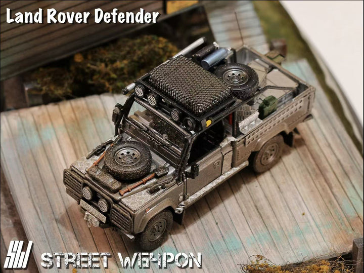 [Preorder] Street Weapon 1:64 Land Rover Defender Tomb Raider Muddy Livery