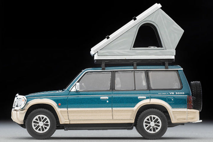 Tomytec TLVN 1:64 Mitsubishi Pajero Mid Roof Wide VR with optional parts (green/beige) 1991 with tent and figure