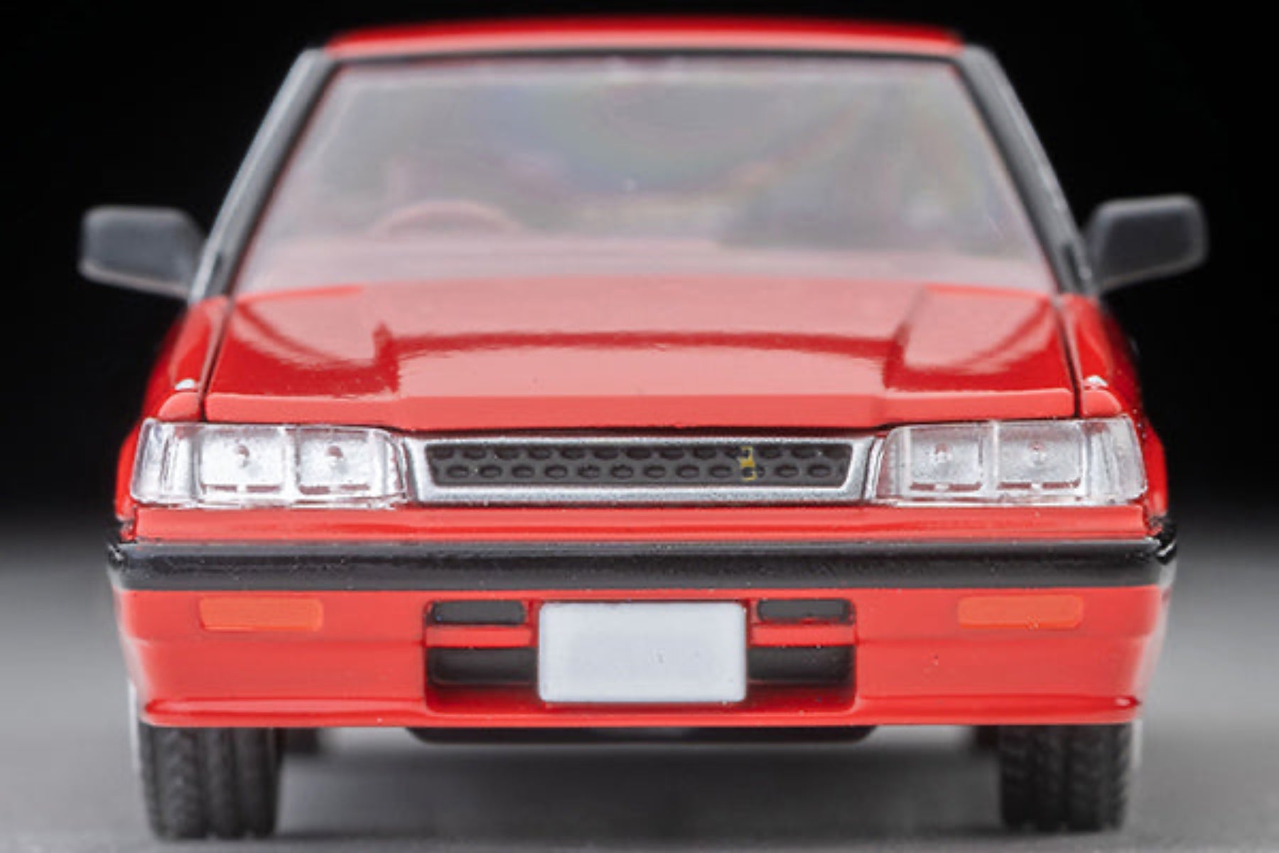 Tomytec TLVN 1:64 Nissan Skyline 4-door HT 1800 Passage (red) 1987