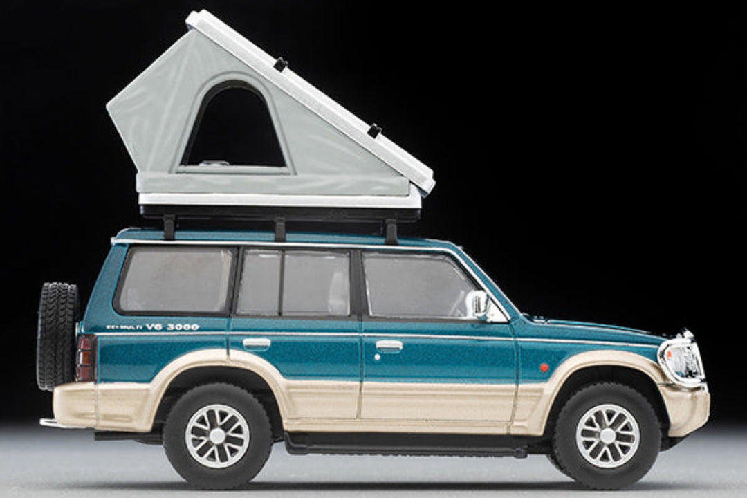 Tomytec TLVN 1:64 Mitsubishi Pajero Mid Roof Wide VR with optional parts (green/beige) 1991 with tent and figure