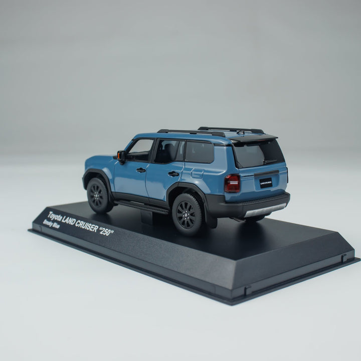 [Online Only] Kyosho 1:43 Toyota Land Cruiser 250 ZX 18inch Alloy Wheels Smoky Blue KS03927SB