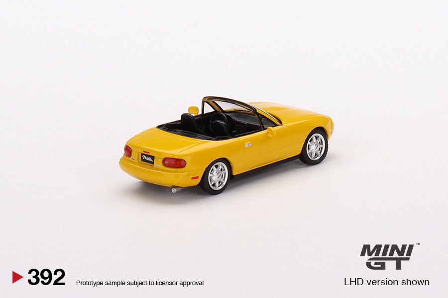 Mini GT 1:64 Mazda Miata MX-5 (NA) Sunburst Yellow LHD MGT00392-L Rear