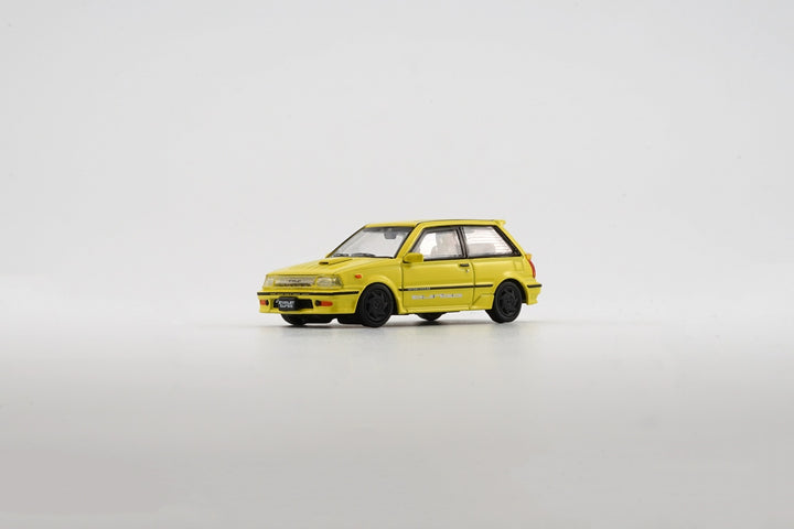 BM Creation 1:64 Toyota Starlet Turbo S 1988 EP71 Yellow (RHD) 64B0258