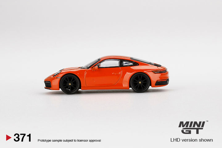 Mini GT 1:64 Porsche 911 (992) Carrera 4S Lava Orange LHD MGT00371-L Side